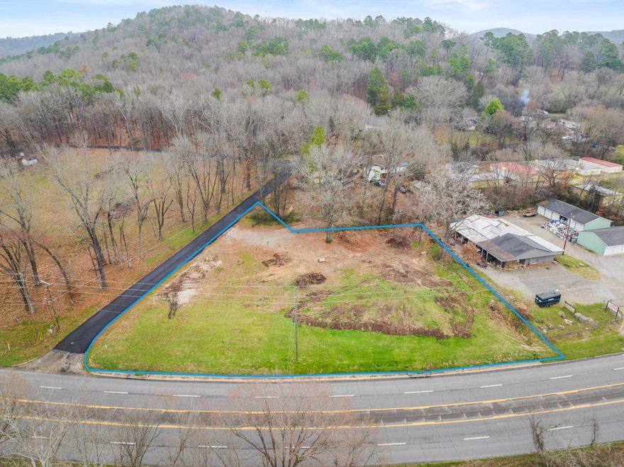 Prime commercial LOT spanning approximately 0.75 acres (exact size to be determined by new survey and parcel split) with excellent frontage on Malvern Road (Hwy 270). This high-visibility location boasts an ARDOT traffic count of 19,000 vehicles per day and is conveniently situated less than a mile from the bypass and just 1.5 miles from Lakeside School. City water and sewer are available on Indian Springs Road, enhancing development potential. Don’t miss this exceptional opportunity in a rapidly growing area!