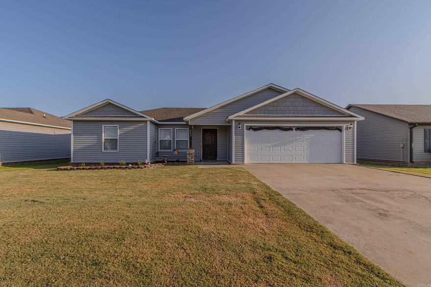 Welcome to Ridgefield Estates! This inviting home features an open floor plan with a vaulted living room and durable LVP flooring. The split bedroom arrangement offers privacy, while the primary suite includes a spacious walk-in closet and double vanity. The kitchen is centered around a functional island, and the refrigerator remains for added convenience. A formal dining space and a walk-in laundry room add both function and style. Outside, enjoy a fenced backyard and a covered porch—perfect for relaxing or entertaining. A two-car garage provides ample parking and storage.