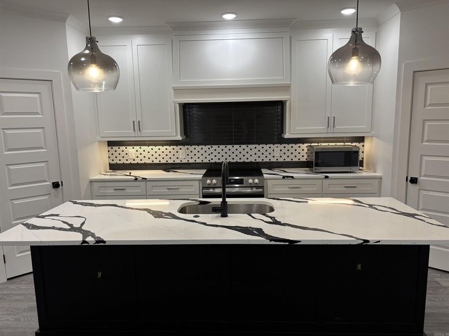 New Construction---Move in ready!!  Spacious 1620 sq ft 3-2 w/2 car garage and all new appliances.  Designer Kitchen with Granite Counter tops, high end appliances, including top of the line washer and dryer. Large Bedrooms with Huge closets.  Great location, close to I-430 & I-630.  Close to downtown, hospitals, university, shopping.