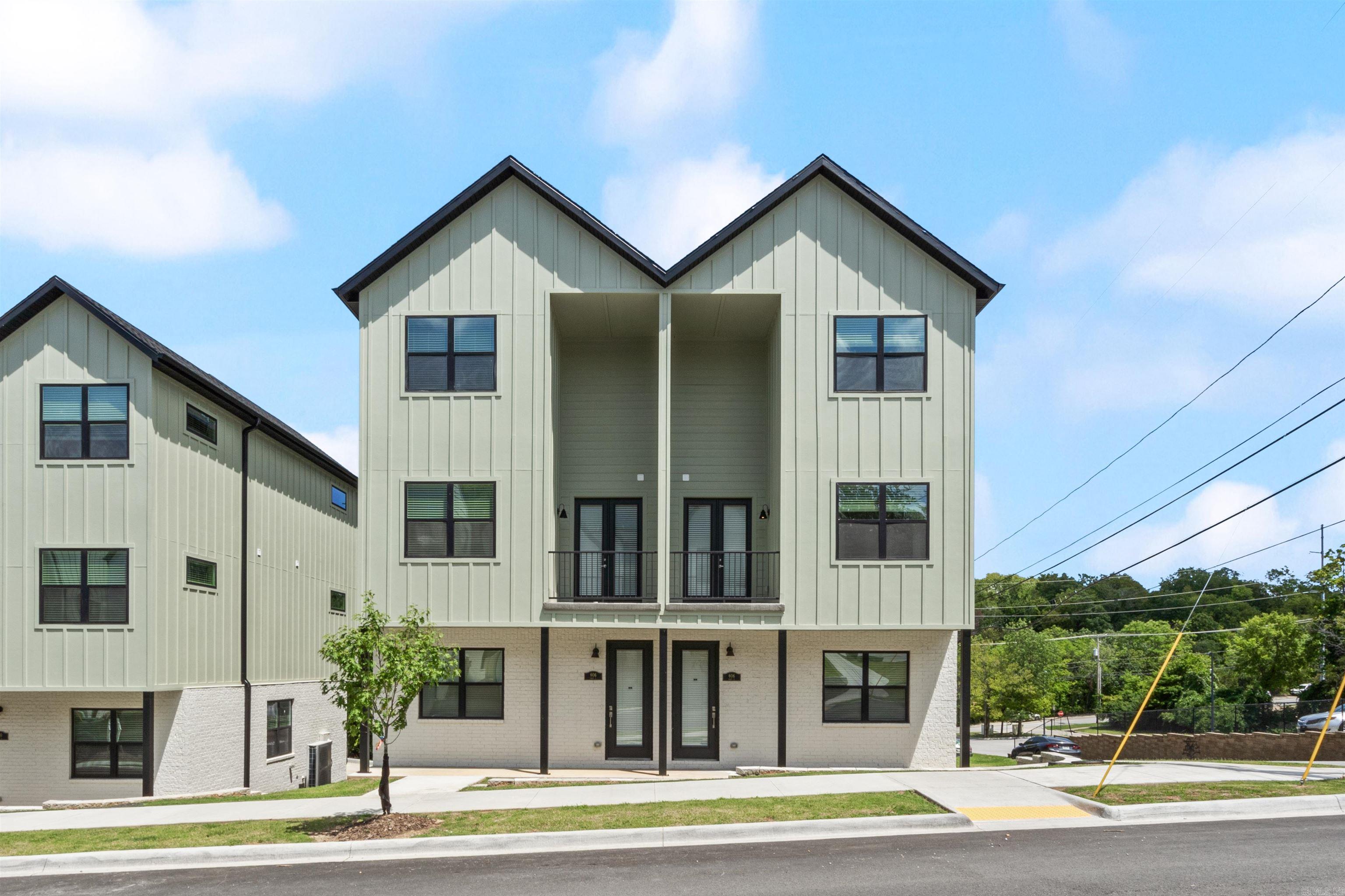 Campus Edge Townhomes is a newly constructed townhome 16-unit property situated on six parcels located adjacent to the University of Arkansas. The fully occupied property boasts large three- and four-bedroom floor plans, high-end finishes, and a mix of attached garages, rear surface parking and street parking. Each bedroom has an en suite full bathroom and a half bathroom in the living area. Units also have supplied washers and dryers and stainless steel appliances. Tenants are responsible for all utilities and the property is serviced by curbside city trash. Management already has a waitlist for the 2025/26 school year with $200 rent premiums. Despite these premiums, new ownership could increase rents beyond the 2025/26 rates, proven out by nearby market rate and student housing properties in inferior locations. Bringing rents to market rate creates tremendous cash-on-cash metrics, an IRR in the mid-20s, and an equity multiple over 2x. Property tours are by appointment only. Do not disturb tenants.