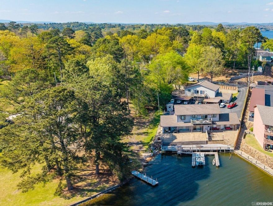 Don’t miss this rare opportunity to own a 9-unit multifamily property on the beautiful shores of Lake Hamilton, offering immediate income and strong rental appeal. The property features a desirable unit mix with eight 2-bedroom apartments—some offering up to two bathrooms—and one 1-bedroom, 1-bath unit, providing flexibility for a variety of tenants. Boat slips are available for tenants to rent, giving residents the chance to fully enjoy lakefront living.  Each unit is filled with natural light, creating warm, inviting spaces that tenants will love. Step outside to take in breathtaking lake views—an amenity that consistently drives demand and adds long-term value.  Whether you’re expanding your investment portfolio or looking for a dependable income-producing property in a prime waterfront location, this is an opportunity with both immediate returns and future potential.