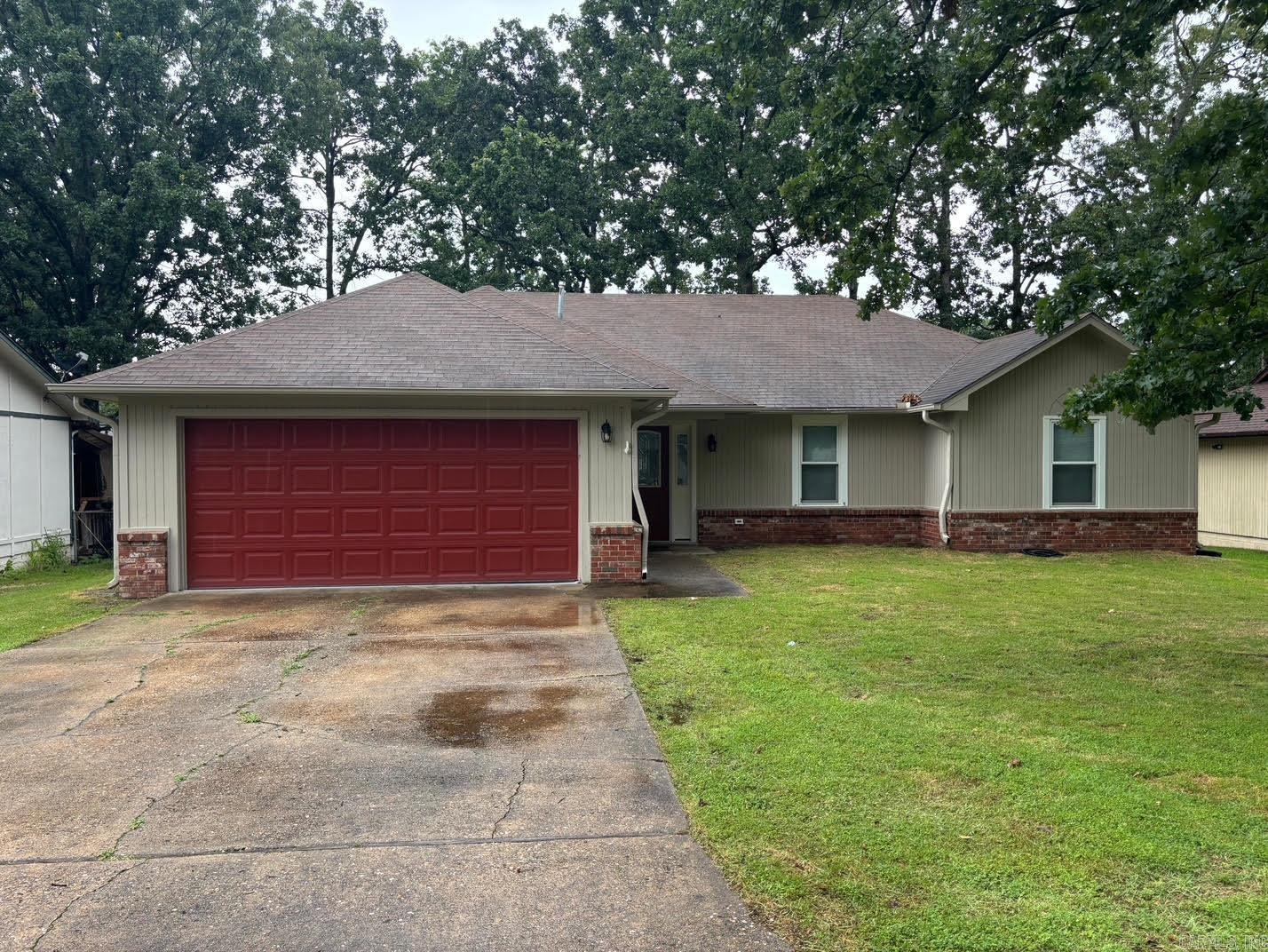 This one in Sherwood is well maintained, move-in ready, and has the versatility of being perfect for either a family or single person; Its 3 bedrooms, 2 full baths, and 1,404 sq ft are well proportioned and make for a good flow to the house; It features a large great room with a vaulted ceiling and exposed wood beam, a nice kitchen with breakfast bar and adjoining dining area (refrigerator conveys), laminate flooring throughout (no carpet), and updated vinyl windows. Outside you have a large, flat lot and yard that is fully wood fenced as well as a storage building. With this one you'll get the advantages of a peaceful feeling neighborhood that feels off the beaten path but is right in the thick of all of the commerce and conveniences one would want. Come see it today!!! (Realtors please also see agent remarks.)