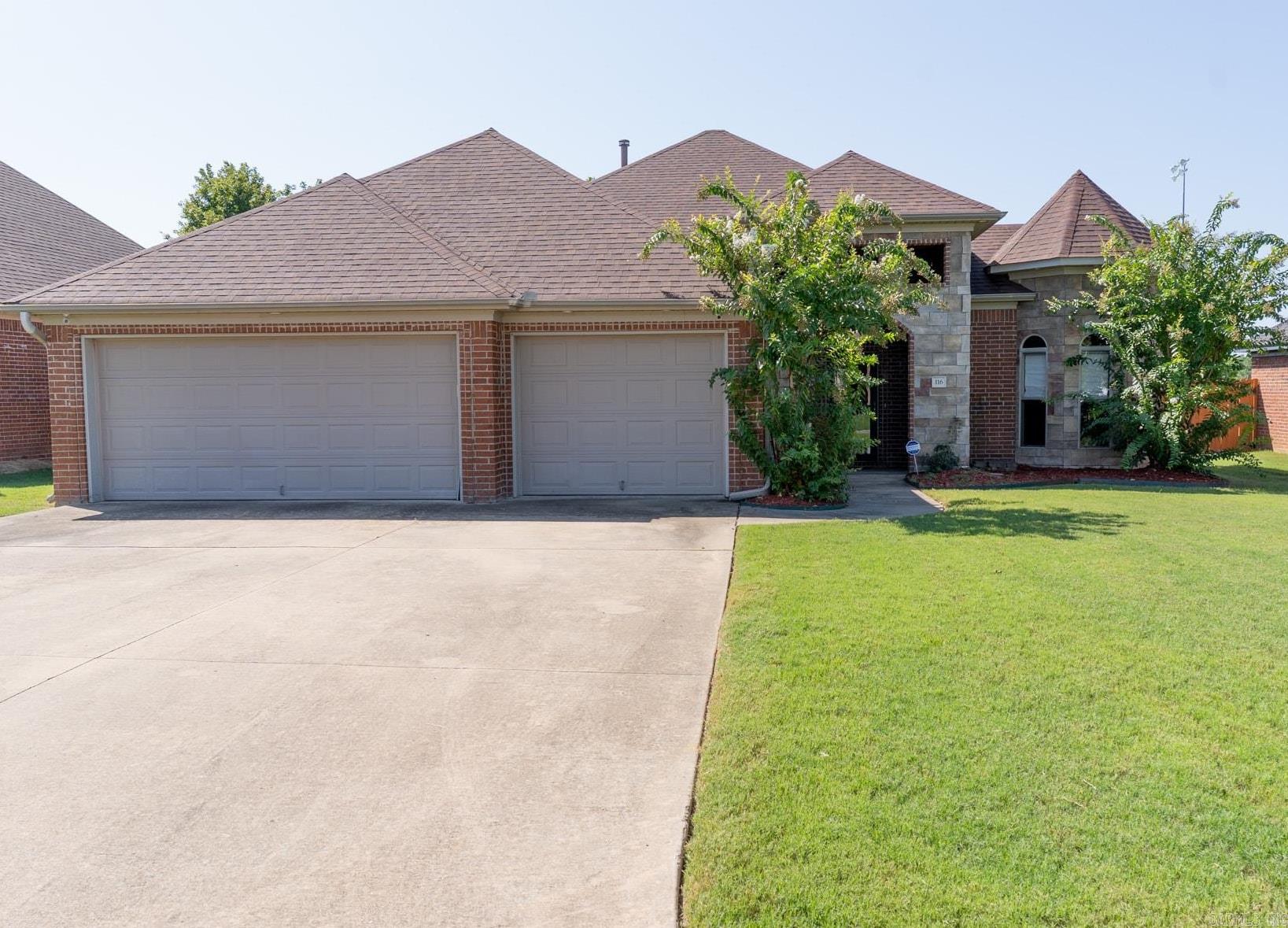 Welcome to your dream home in the Country Club of Arkansas. This stunning 4-bedroom, 2-full-bath residence offers an open concept layout with beautiful hardwood floors throughout. The kitchen features stainless steel appliances, including a gas range, granite countertops, and ample cabinetry for all your cooking needs. The master bath is complete with a whirlpool and a walk-in shower. Step outside to a covered patio perfect for relaxing or entertaining. Additional features include a 3-car garage, brand-new fence and solar panels that will be paid off. Schedule your showing today and make this beautiful property your new home.