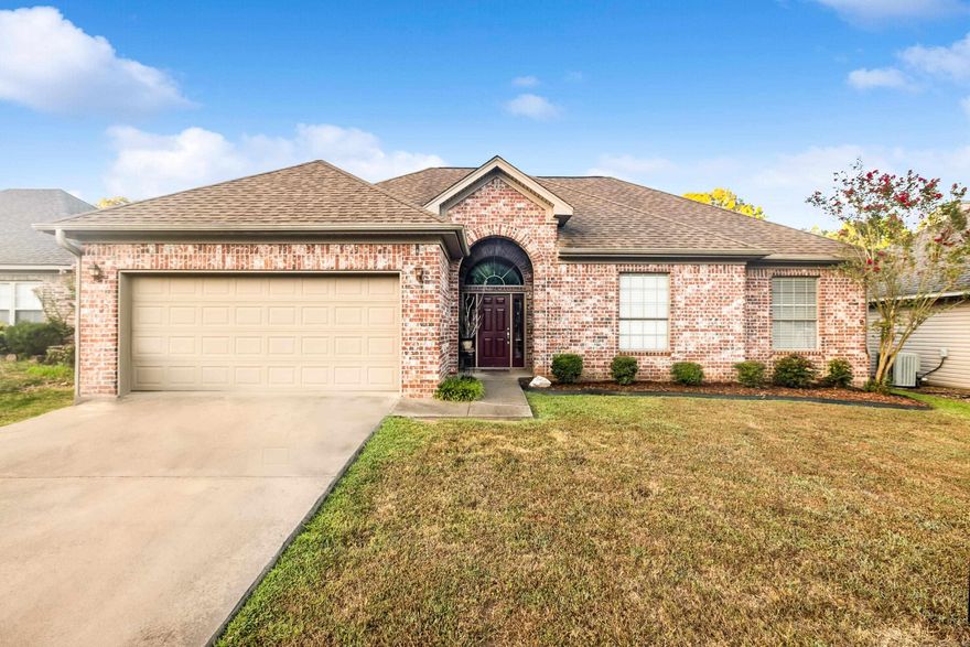 Adorable brick home in Bauxite – close to town and move-in ready! This 3-bedroom, 2-bath home lives like a one level with only the spacious bonus room upstairs. Upon entering the grand foyer, you will be greeted with a cozy living room with hardwood style floors and a double sided fireplace. The open kitchen has large dining area and spot for a coffee or wine station. The primary suite offers a private shower area, large soaking tub, and a huge walk-in closet. The bonus room upstairs would make a perfect for an office, playroom, exercise room, or extra living space. Updates include a new roof in 2018, HVAC in 2021, hot water tank in 2019, LVP flooring installed in 2015 (no carpet anywhere), and a brand-new privacy fence in July 2025. Conveniently located right off the main highway, for easy commuting into Bryant, Benton, or Little Rock!