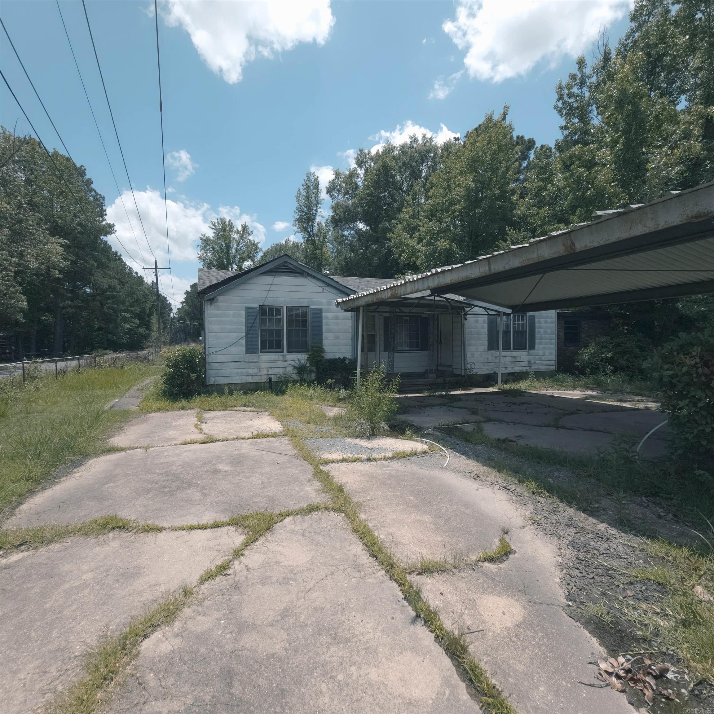 Investor Special!! Whoaa.....look at this opportunity a 3 bed, 2 bath home with 2 living areas, and a bonus room. A kitchen/dining combo, laundry room, and 2-car garage. The primary bedroom includes a large size bathroom. ALL of this on a spacious corner lot in White Hall/Dollarway area. With 1,800 square feet of potential, this fixer-upper is perfect for a rental or flip. One of the living spaces could be converted into a 4th bedroom, making this an ideal rental for larger families. Sold as-is. Don’t miss this opportunity to build equity and generate cash flow!!