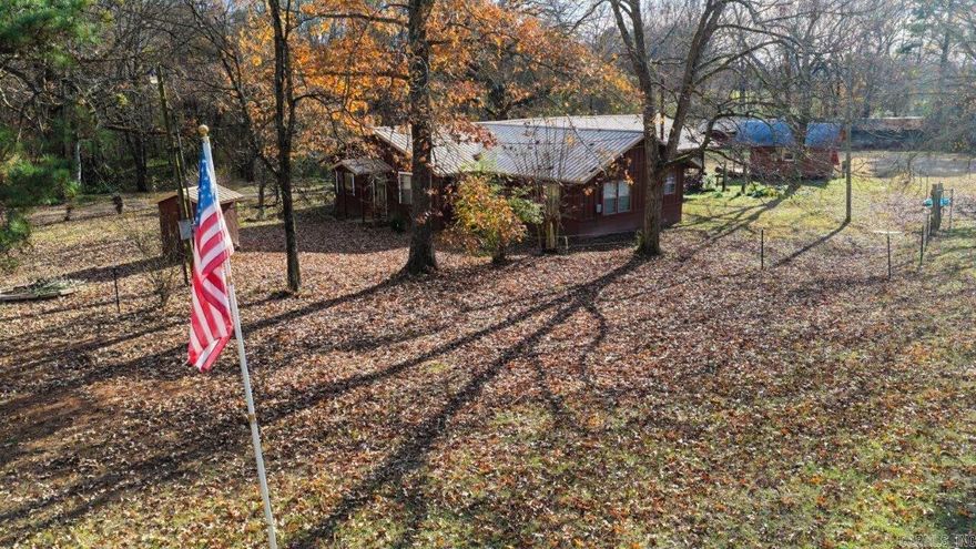 Private Country Oasis in these 2 homes for price on 1 property! Nestled in a wooded setting off of a private country lane! This offers a 3 or possible 4th bedrooms, 2 bath home with 2 living areas, a bonus craft or plant room, laundry room, office and storage galore. The guest house is studio style with 1 bedroom, 1 bath and open kitchen and living area. Great multifamily set up or rentals. Theres an older chicken house with a half slab that is great for a shop. Also has she shed. Home was remodeled in 1999 and offers new metal roof and HVAC system. Sits on 8 private acres with a creek there are 2 water wells and septic systems.