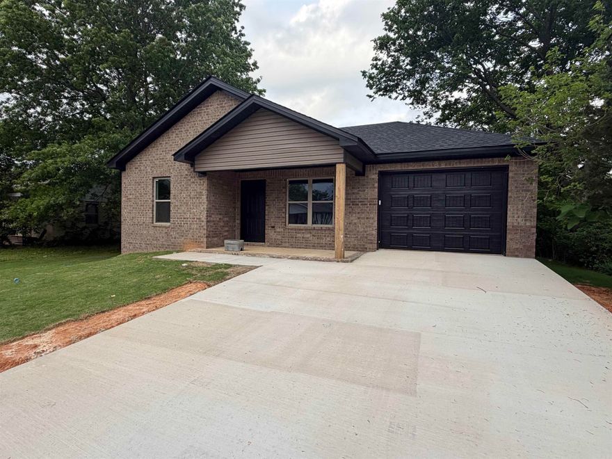 Perfect starter home! Brand new 3 bed, 2 bath home 1250 sqft featuring white shaker cabinets, granite countertops, and stain concrete floors throughout. Open concept with modern finishes. Will be complete in a couple weeks