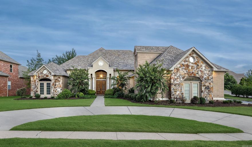 Stunning custom-built home in the highly sought-after Villages at Wellington! 4BR, 3.5BA on a flat corner lot with circle drive and 3-car side-entry garage. Open floor plan with hardwoods throughout—no carpet! Grand 14’ ceilings, two fireplaces, and an exposed brick kitchen with massive granite island, gas range, and abundant storage. Luxurious primary suite with private HVAC, floor-to-ceiling windows, spa bath featuring double shower heads, Jacuzzi tub, built-ins, and French doors leading to the covered patio. Two additional bedrooms down, plus office with built-ins. Upstairs offers 4th BR, full bath, and large game room—ideal for in-law quarters! Massive covered patio with hot tub and direct gas line for grill. Fully fenced yard with rod iron fencing. New roof (2020) and three new HVACs (2024). Walk to pool, playground, and tennis/pickleball courts. Perfect one-level living and an entertainer’s dream! Agent see remarks.