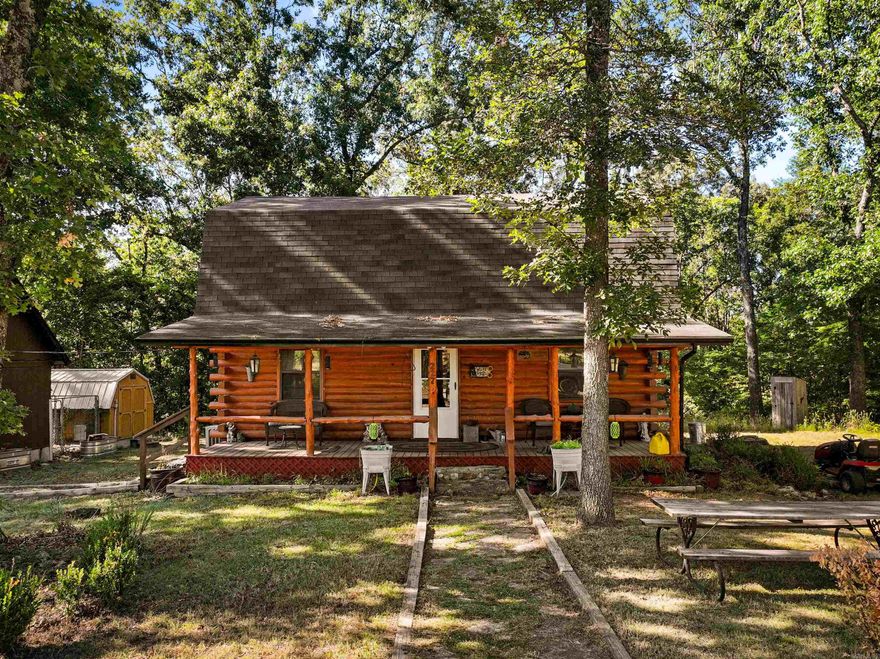 Discover tranquility in this charming 3-bedroom, 2-bathroom cabin on a sprawling 10-acre property, just 6 minutes from the White River and Crooked Creek. The cozy cabin features a spacious living area, an adorable kitchen, and three comfortable bedrooms. You'll love the serene atmosphere and the modern conveniences this home offers. The expansive grounds boast fruit trees, a storage shed, a dog pen, a goat pen, and a chicken house, providing everything you need for a self-sustaining lifestyle. Additionally, there's a versatile building with electricity that includes a loft, perfect for converting into another home or studio. Enjoy unparalleled privacy and seclusion while being conveniently close to outdoor adventures. Embrace a peaceful, self-sustaining lifestyle in this beautiful retreat!