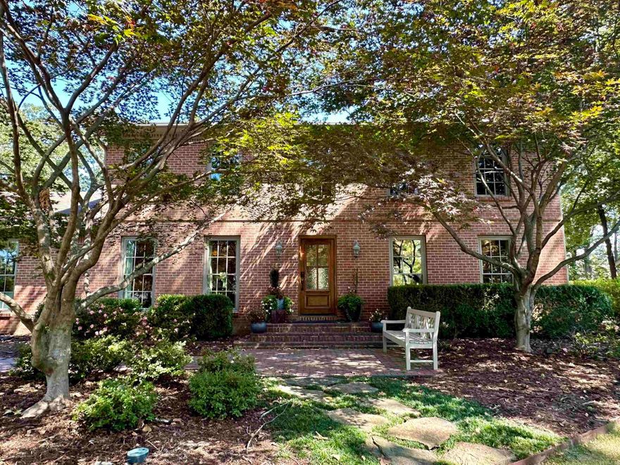 Stately Pleasant Valley home on large, beautiful lot.  Many updates throughout, huge primary bedroom suite on main level.