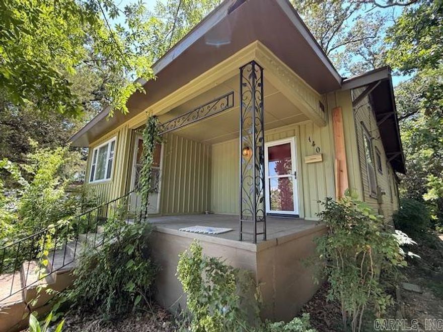 Step into this charming 1900s Craftsman-style Bungalow, where classic elegance meets modern convenience. Inside, you'll find two generously sized bedrooms connected by a Jack-N-Jill bathroom, plus an additional half bath, all enhanced by impressive 12-foot ceilings. Located in the heart of Hot Springs, this bungalow is just a stone's throw from the excitement of Oaklawn Casino Resort and the scenic beauty of Downtown Hot Springs. Imagine starting your day on the 12x15 screened-in porch, complete with enclosed storage underneath. Surrounded by lush, shade-giving trees, this home offers a peaceful retreat while still being close to all the action. Ready for you to move in or use as the perfect vacation getaway, this bungalow combines historic charm with an unbeatable location.
