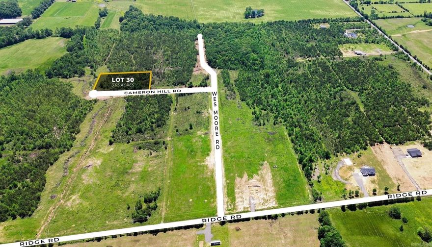 Beautiful flat 3.03+/- acre lot right outside of city limits, perfect spot if you are looking to build! Enjoy great views of the countryside in a quiet area while only being a few minutes from the interstate. 20 mins to Vilonia, 20 mins to Searcy, & 20 mins to Cabot. Water is at the road and electric is at Ridge road. No mobile homes. Minimum square footage of 1800.