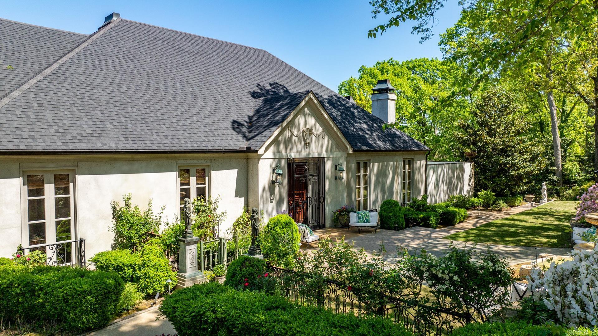 A truly remarkable property! This Heights home is in immaculate condition. When entering the foyer, the formal living is to the right with 15 foot ceilings which opens to a charming side patio with copper waterfall. There is a beautiful birchwood lined family room to the left & the oversized dining room is ahead. The dining opens to the back patio that overlooks the gorgeous pool & fountain. The primary suite is incredible with an amazing bathroom & closet on the main level! Beautiful wood doors line the room with curtains (on remote to close at night) as well as heated floors, fireplace & a seating area! Incredible!! Light filled kitchen with hearth room & breakfast table space. So much storage & cabinetry with the biggest butlers pantry! 1/2 bath, office or guest bedroom (full bath) on main as well. Downstairs are two (or 3) bedrooms. Exercise, wine, cedar lined walk in closest, & holiday/storage wrapping room. Each bed has full bath & screened porch leading to a covered porch overlooking pool. A FAB pool room with 2 showers and double doors that lead to an outdoor garden room overlooking large lot. 3 car garage. Elevator. Every major system in home is less than 4 years old!