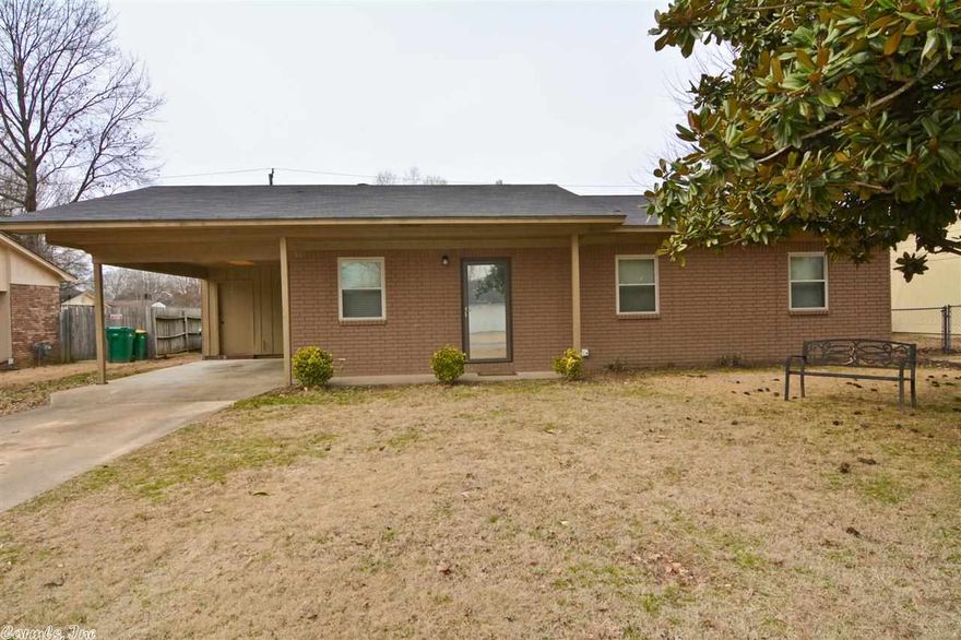 All brick 3 bedroom/1.5 bath home has numerous updates.  Kitchen has all new stainless steel appliances, concrete countertops, recessed lights with updated cabinets.  Laminate flooring with fresh interior paint.  New windows and heat/ac unit (and duct work) in 2014.  Roof was replaced in 2012.  Fenced back yard and storage building will convey.