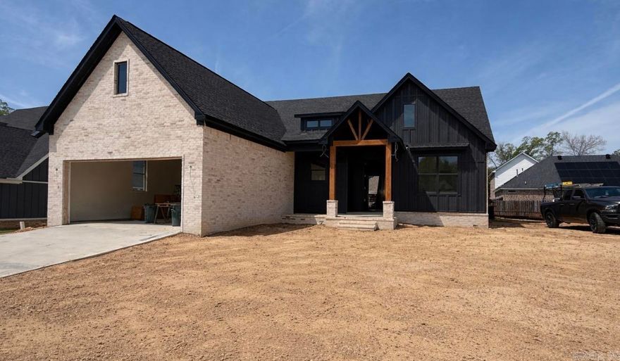 NEW LISTING in SALINE COUNTY! This New construction is almost complete and ready for its first owners! Beautiful 4 bedroom, 2 full bath home features an open floorpan with tall ceilings that create a bright, spacious feel throughout. Perfect for relaxing with the family or entertaining.  Located on a quiet cut-de-sac, it offers both privacy and minimal traffic-perfect for comfortable living.  Large back patio and large side yard.  The finishes are being installed now, so come out and walk through this beauty!