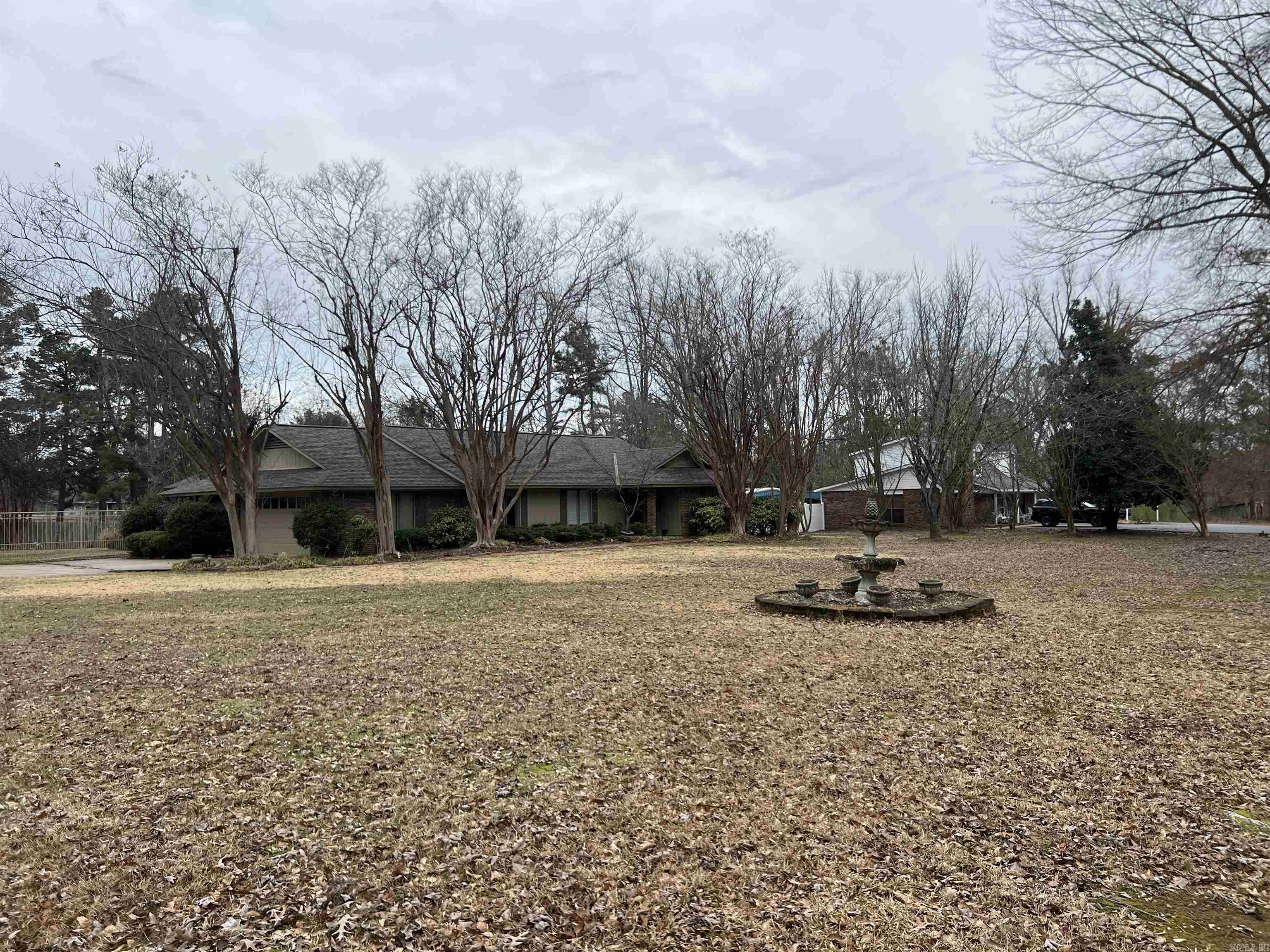 This charming 3-bedroom, 2 and a half bath home sits on 3.45 acres and boasts a brand-new 2023 roof, a newer 5-ton HVAC system, and fresh paint throughout. Inside, you'll find a spacious living room with a cozy fireplace, beautiful hardwood floors, plantation shutters, and generously sized bedrooms with ample closet space. Outside, enjoy the gazebo-covered porch, a fenced-in backyard, a carport with storage, a shed, a shop, and a two-car garageāoffering plenty of space for hobbies, storage, and outdoor enjoyment. This property is the perfect blend of comfort, style, and functionality!