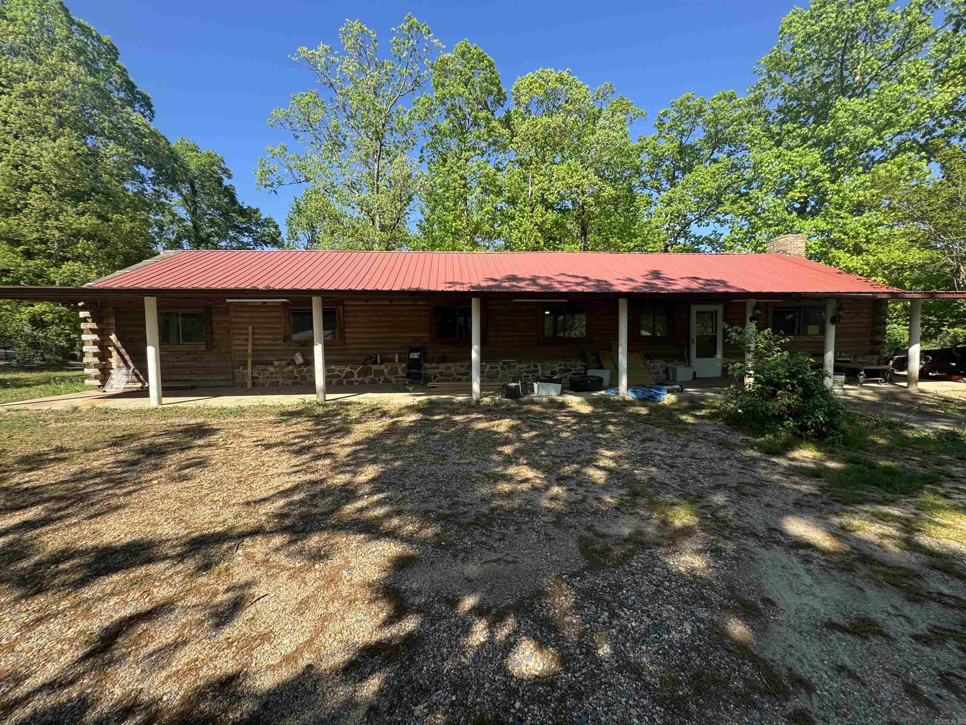 Looking for a great location for a future business possibilities, a shop and a home? Check this property out! 2 acres located just outside the city limits of DeQueen, AR on JB Logan Cr & US HWY 71 N frontage. This home offers 1680 sqft of living space, 3 bedrooms and 2 baths, with a possible 4 bedroom and or office space. Covered front and back porches and 23x30 Shop.