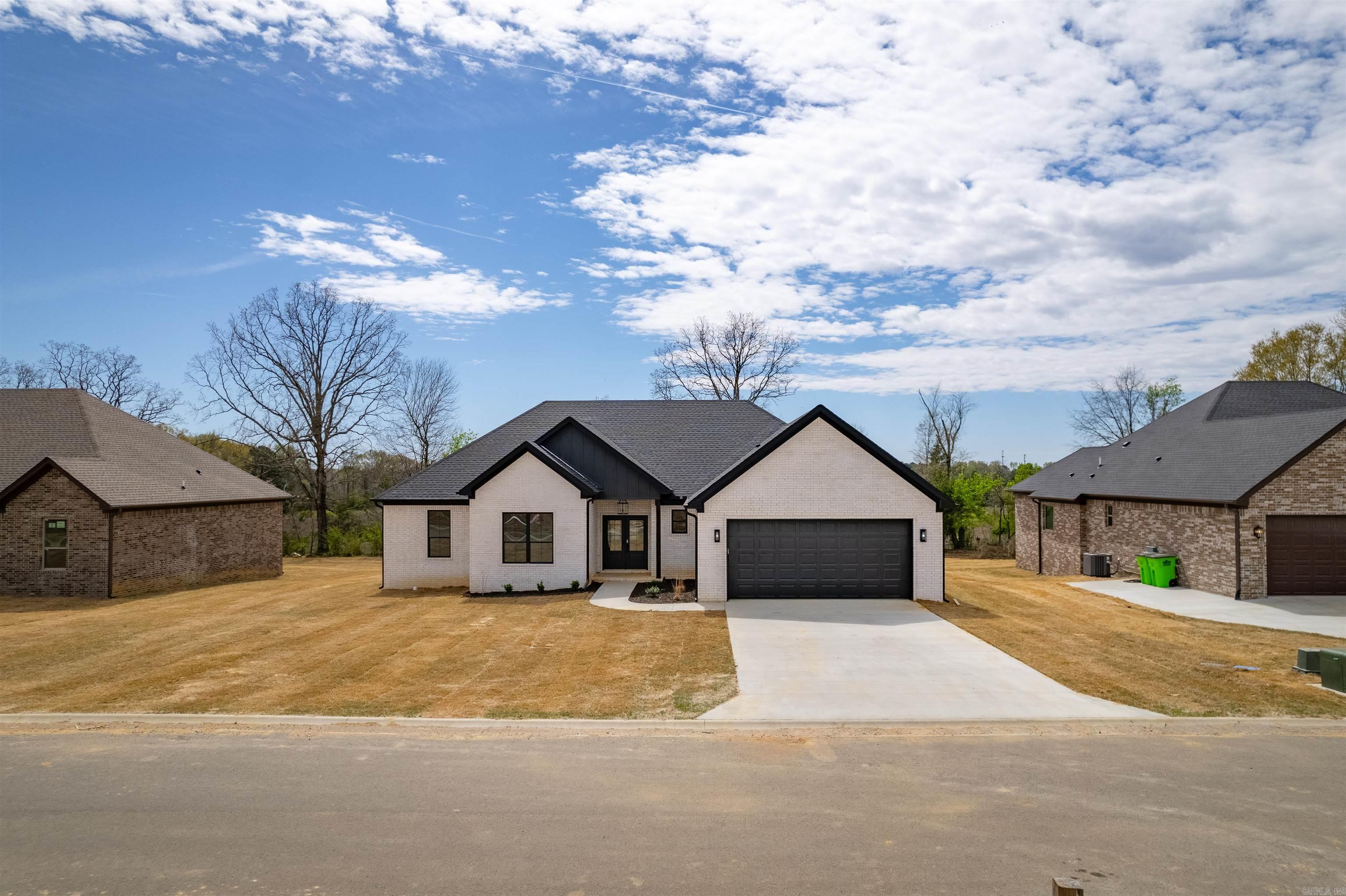 Stunning New Construction | 4 Bed | 2 Bath | 2,100+ Sq Ft | Hidden Valley Estates, Beebe Welcome to 240 Michelle Drive—a gorgeous new construction home that perfectly combines quality craftsmanship, stylish design, and modern functionality. Situated in the highly desirable Hidden Valley Estates subdivision, this property is ideal for families, professionals, or anyone looking for a peaceful neighborhood setting with quick access to everything Beebe has to offer. Property Highlights: 4 Bedrooms | 2 Bathrooms | Approx. 2,109 Sq Ft Split floor plan offers privacy with a spacious primary suite separate from the secondary bedrooms Primary bathroom includes a soaking tub, custom-tiled shower, dual vanities, and a walk-in closet you’ll love Chef’s kitchen with granite countertops, custom cabinetry, stainless steel appliances, large island, and walk-in pantry Open-concept living space with tall ceilings, recessed lighting, and durable luxury vinyl plank flooring throughout Dedicated laundry room with extra storage and convenient garage entry access Two-car garage, fully finished with modern touches and insulated for efficiency Covered back patio perfect for out