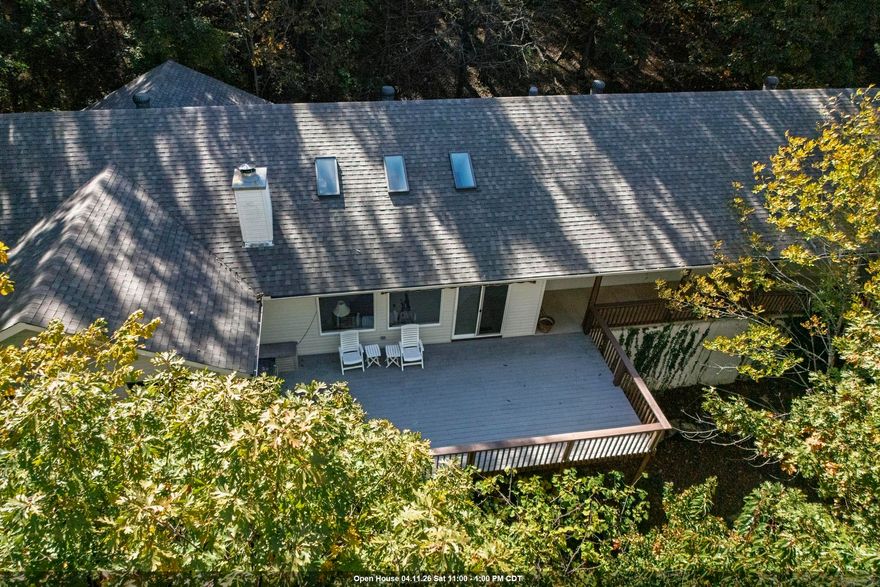 2.5% assumable mortgage. This is a very unique property sitting on 1.33 acres, you must see in person to really appreciate. A modern CUSTOM with a mid century flare. Open floor plan, high ceilings, lots of windows to enjoy the beautiful wooded scenery. Spectacular winter mountain views are just a month away. The Chefs Kitchen is situated perfectly to interact with your guests when you have them or to just appreciate your surroundings in solitude. All appliances convey and the pantry gives you all kinds of bonus storage. 3 Bedrooms and 3 baths, all a generous size. One is set up as an office with built-in's that include a Murphy bed. Wood burning stove in the family room as character and makes for a cozy winter. Large laundry/mud space and an oversized garage. Wider driveway with extra parking areas. Roof December 2024.