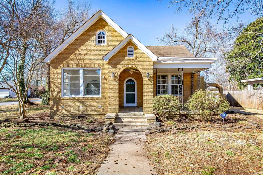 Want a Charming 2-bedroom 1-bathroom home on large corner lot?  The arched doorways, Original Doors, Breakfast nook with built-ins, and Original Terrazzo tile in Sunroom transport you back in time.  This home offers New Granite Kitchen countertops, New Backsplash in Kitchen, New Electric Range, and New Vinyl flooring. Schedule your showing today!