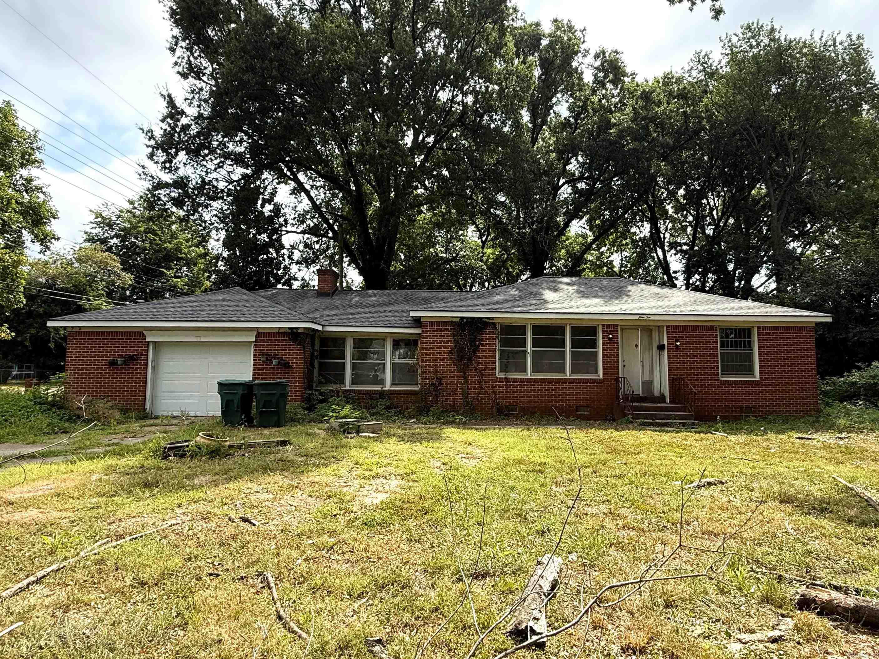 Welcome to 910 Ruddle Rd., a 3-bedroom, 2-bath home offering 1,802 sq ft of living space on a generous 0.65-acre corner lot. This property is ideal for investors, DIY enthusiasts, or anyone looking to transform a house into a home. Featuring a functional layout with ample natural light, this residence offers plenty of potential to reimagine each space to your taste. The expansive lot provides privacy, room to expand, and plenty of outdoor possibilities from gardening to entertaining. Located in a quiet residential area of Blytheville, with convenient access to local schools, shopping, and highways, this home combines the charm of a peaceful neighborhood with the benefits of a central location. With the right vision and some TLC, this property could become a standout gem. Don't miss your chance to add value and create something special. Selling as-is. Bring your ideas and make it your own!