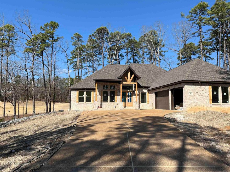 BUILDER WILL PAY DIAMANTE CLUB DUES FOR 3 YEARS, A $30,000.00 VALUE.  Carriage Homes has been awarded home builder of the year 7 times in HSV and Diamante is an award- winning golf course rated in the top three in Arkansas.  Why just live in the largest gated community in the U.S. when you can also live in a private county club.  Golf every day or as often as you choose and bring your friends and family and they can play 3 rounds of golf a month free!  Plus live in style in this gorgeous Carriage Home.  Hardwood floors (no LVP) designer tiles, elegant primary bedroom and bath with huge walk- in closet. Storage galore with walk-up staircase to attic storage. This one sits off the road for privacy and has a great view of the course.  Not many good lots left!  This is one of them!
