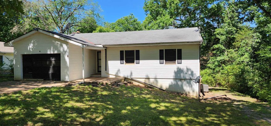 Over 1300 square feet of prime fixer-upper potential! This 3 bed 1 and 3/4 bath is located in the heart of Cherokee Village, walking distance to Papoose Park and Lake Cherokee! Already partially stripped, this home is a fantastic canvas for someone to transform into a dream home!