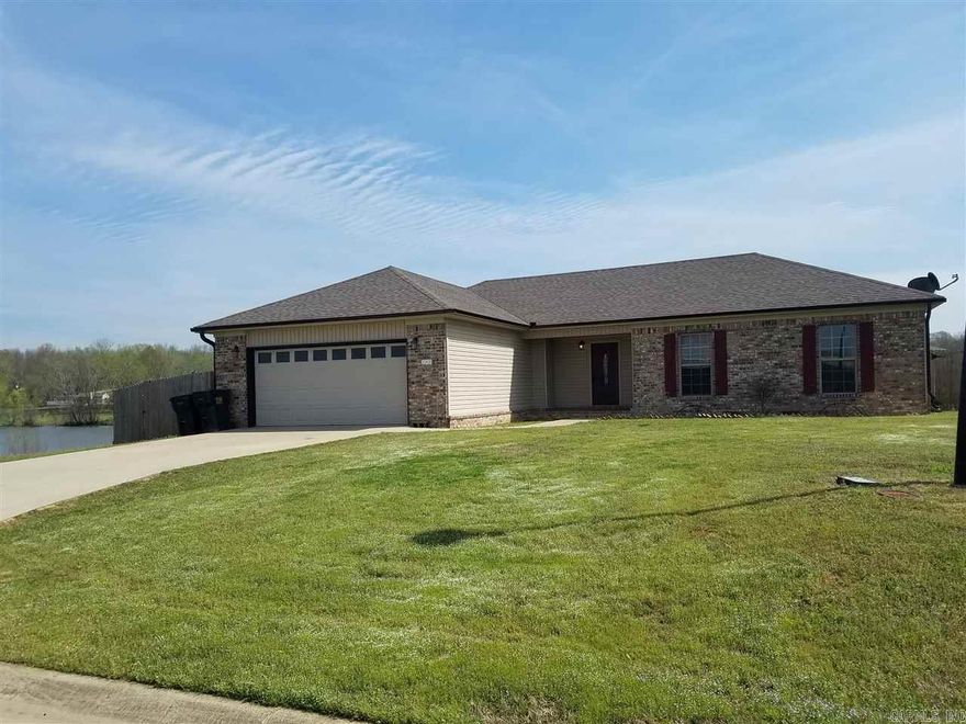 Great 4 bedrooms and 2 baths with an open concept and split floor plan. House set directly on Willow Lake.