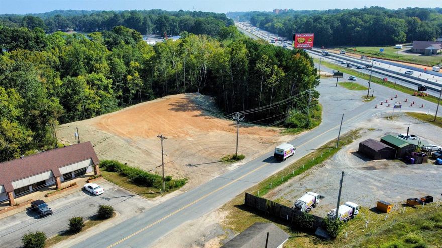 Prime Commercial! Great Visibility from I-30 and Service Road. Steps from Caldwell Elementary. The property has recently been cleared, partially filled, smoothed, and ready for your business! Drawings and Survey online for reference purposes only. Pad area is approximately 0.79 Acres.