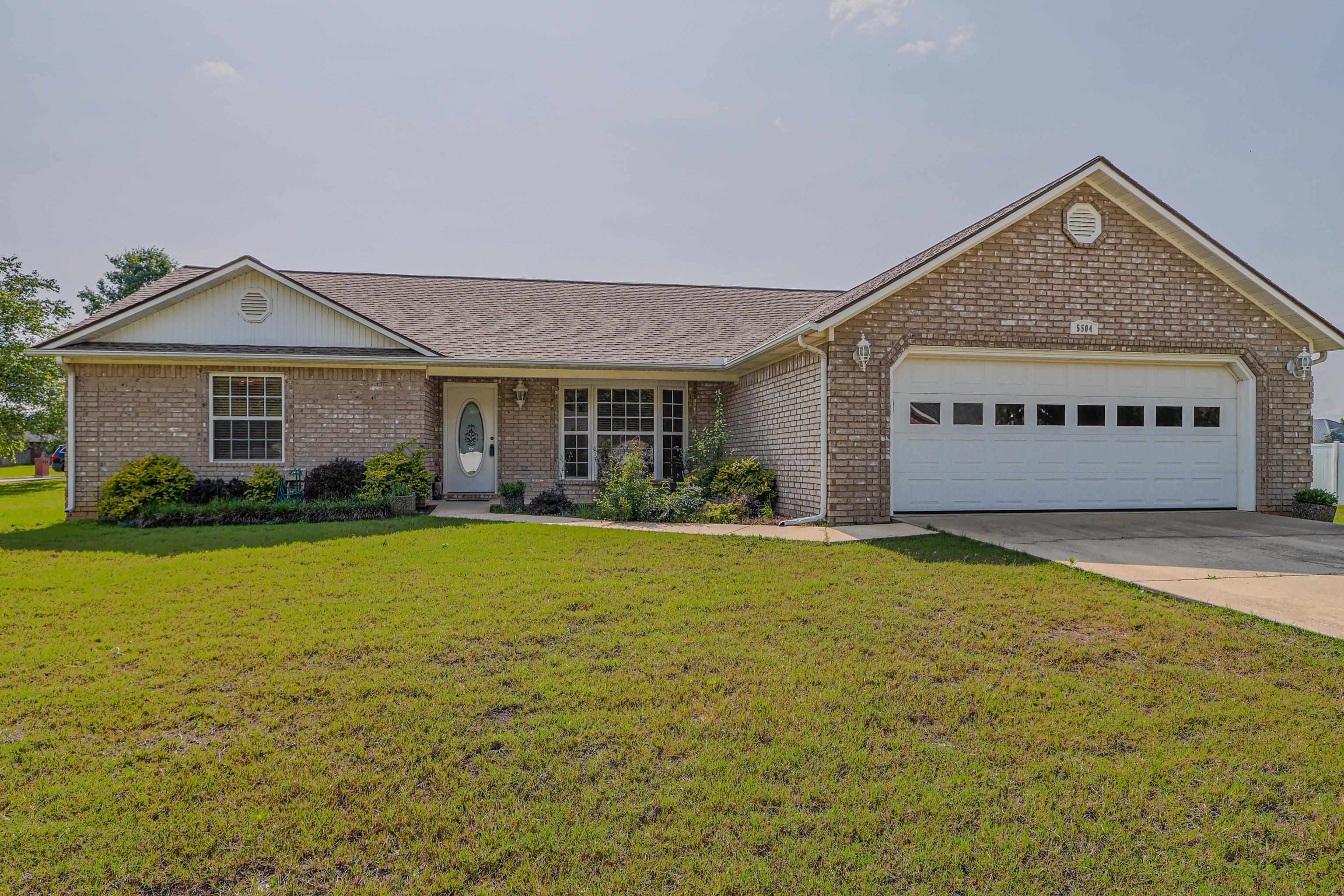 Well-maintained 3 bed, 2 bath brick home in the desirable Carriage Hills subdivision. This 1,774 sqft home sits on a .27-acre corner lot and features a split floorplan, spacious living areas, and a large covered back deck—perfect for entertaining. The master suite includes a jetted tub and his-and-her closets. Enjoy ample storage in the 2-car garage with built-in closets. Great location with curb appeal and room to relax both inside and out!