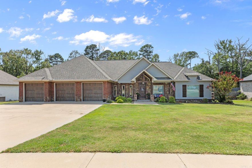 This stunning Craftsman-style home, built in 2018, is a true gem in the heart of Oak Tree Ridge subdivision in Sheridan. The open living floor plan is perfect for entertaining, with a spacious great room featuring a beautiful electric fireplace and large windows that let in an abundance of natural light. The kitchen is equipped with a large pantry and plenty of counter space, making meal prep a breeze. The master suite is a serene oasis, complete with a soaker tub and walk-in shower, as well as a generous walk-in closet. The home also features three additional bedrooms, each with ample closet space, and 2.5 bathrooms. You'll love the expansive back porch, complete with a wood-burning fireplace, flat-screen TV, and an outdoor kitchen space perfect for dining and entertaining. Located in the sought-after Oak Tree Ridge subdivision, this beautiful home is just minutes from downtown Sheridan and offers easy access to shopping, dining, and outdoor recreation.