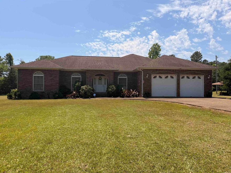 Well kept house on 9.81 acres with formal living room and dining room, separate sitting area in master bedroom and screened-in back porch.  Property also includes a separate guest house, hot tub, storage shed, enclosed RV storage and pond.  Guest house is 840 sq ft. Storage shed is 16x30’. RV storage is 16x48’ with 14’ ceiling.