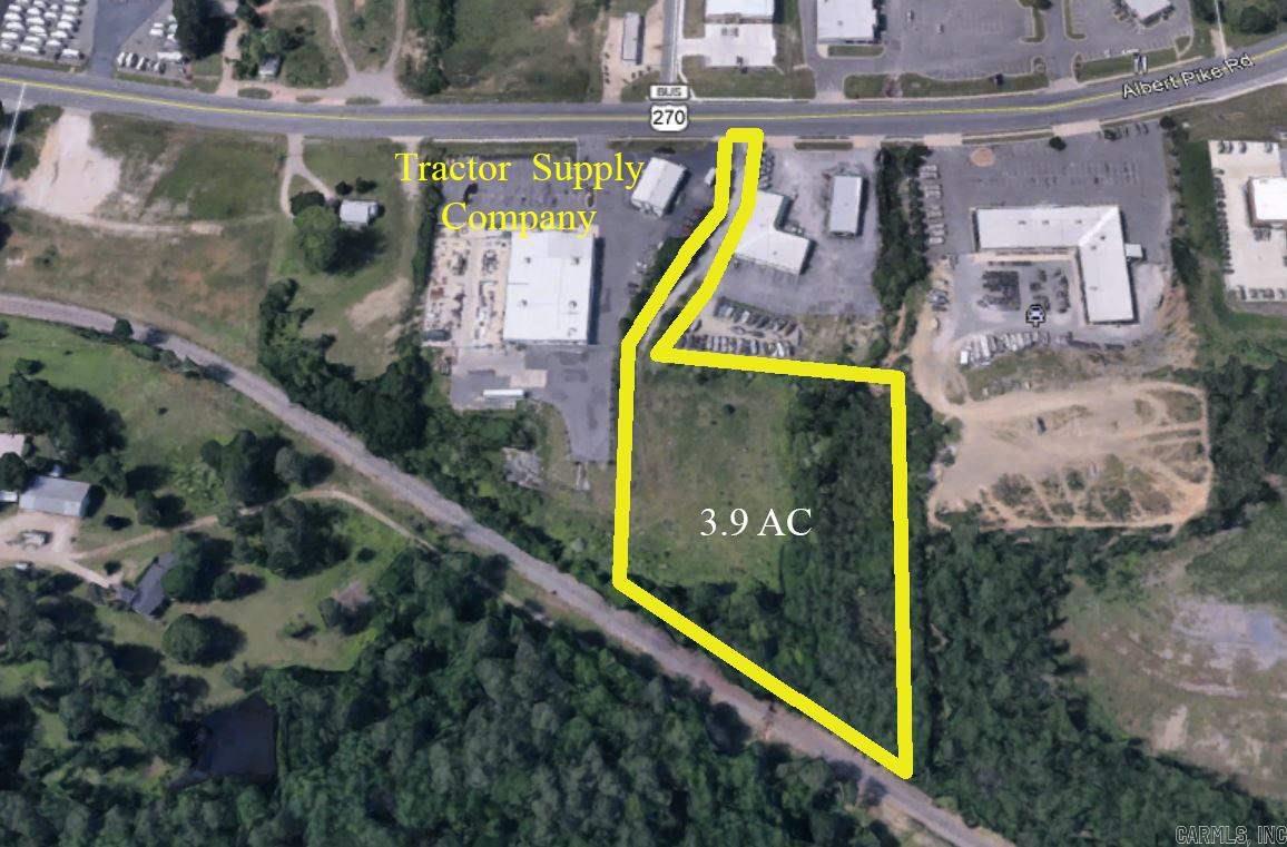 Great location and accessibility are the strong assets of this hidden gem of a property near the by-pass on Albert Pike! Almost 4 acres and near-level contour make for unlimited possibilities!