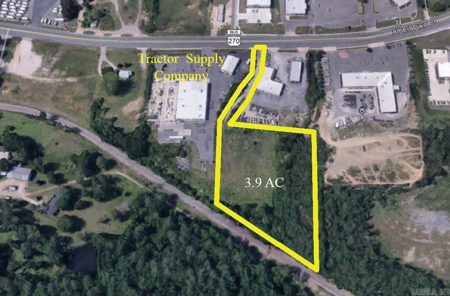 Great location and accessibility are the strong assets of this hidden gem of a property near the by-pass on Albert Pike! Almost 4 acres and near-level contour make for unlimited possibilities!