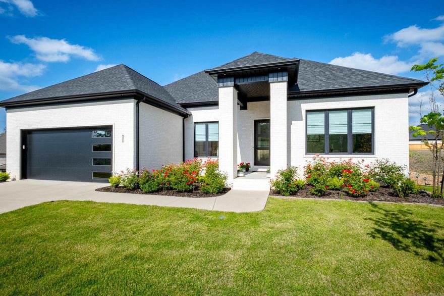 Experience modern luxury at its finest in the supremely located 1 Corlay Drive, nestled in the central cul-de-sac with common ground on the northwest side. Completed in 2022, this exquisite residence has been meticulously crafted with an open floorplan and thoughtful upgrades to elevate your living experience.Step inside to discover an enclosed covered porch, seamlessly integrated with flooring and equipped with heat/air for year-round enjoyment. Enhancements continue throughout the home with the addition of walk-in showers in two guest baths. Gas and electrical capabilities have been added to accommodate a generator, ensuring peace of mind during unexpected power outages. Hunter Douglass blinds adorn the windows, offering both privacy and style, while a tankless hot water heater ensures a continuous supply of hot water, catering to the needs of modern living. Storage abounds throughout the home, providing ample space to keep your belongings organized and easily accessible. Whether it's a spacious pantry in the kitchen or custom closets in the bedrooms, you'll find storage solutions to suit your lifestyle.  Come and make this exceptional home at 1 Corlay Drive yours!