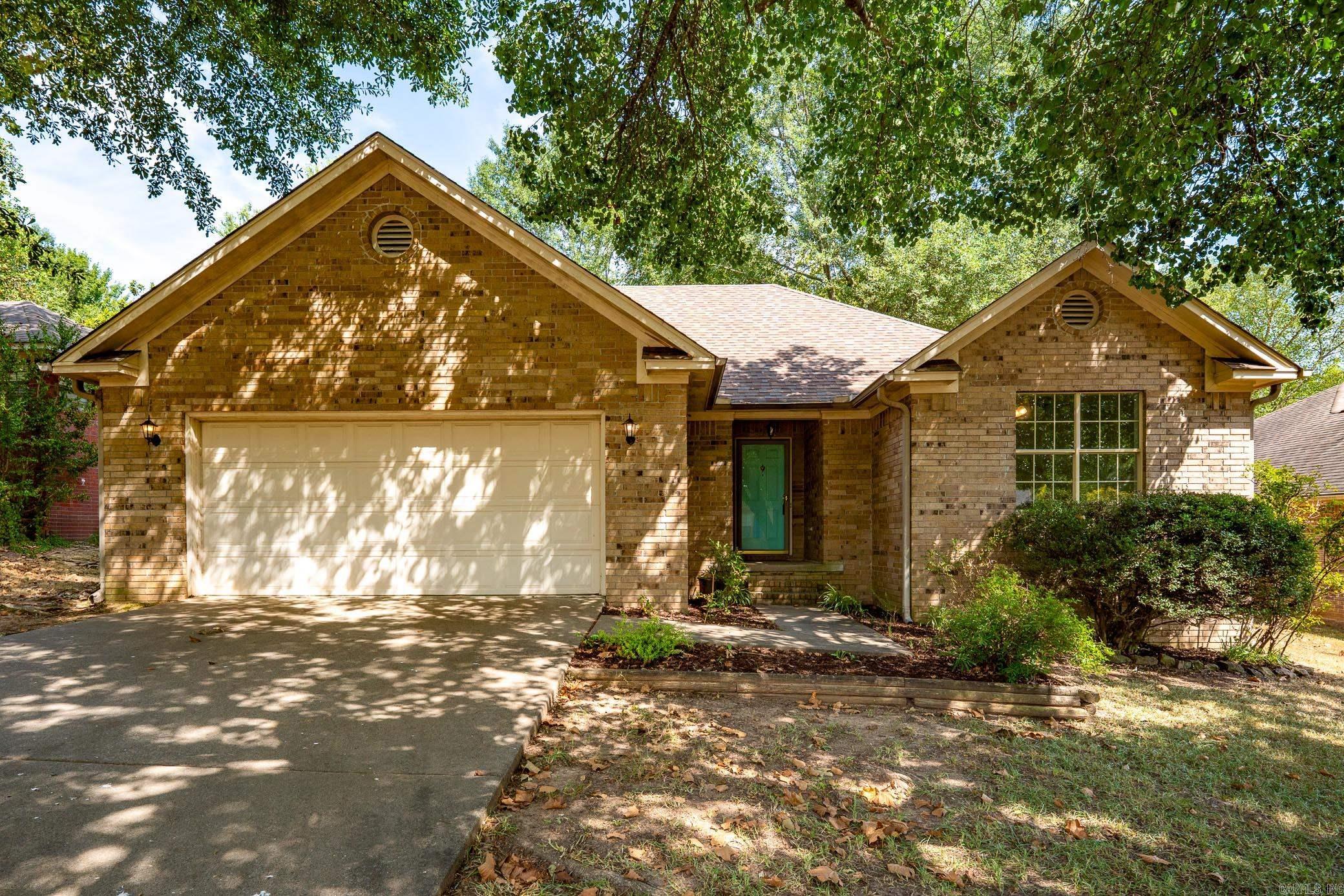 Charming all-brick home on a tree-filled lot in desirable Northwest Conway! Nestled on a cul-de-sac street, this property features a newer roof, fresh paint, and brand-new laminate flooring throughout the main areas. The spacious great room with a gas log fireplace is perfect for gatherings, while the kitchen offers plenty of cabinets, a pantry and stainless steel appliances for modern convenience. Step outside to enjoy the deck overlooking the shaded yard, plus a 20x14 shop with electricity for hobbies or extra storage. Conveniently located near schools, shopping, restaurants, and easy interstate access, this home combines comfort and convenience. Donāt miss this move-in ready gem!