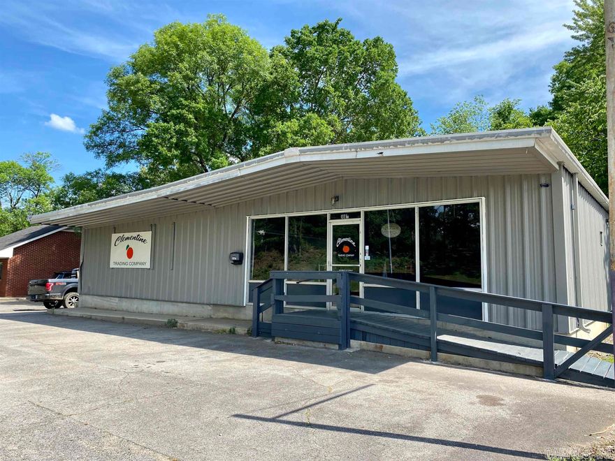 Commercial Red Iron Building on US Hwy 64/Main Street in a highly visible location across from the City Police Station just above Historic Downtown.  Over 3300 sq.ft. all heated & cooled.  Like-new HVAC System.  Commercial Glass/Display window & handicap ramp.  Floor plan consists of 4 large rooms that could easily be modified to fit your business needs.  Restroom!  Existing pole sign!  Loading Dock!   All the features to accommodate a multitude of businesses. Reception/sales countertop included!  Great location for many business uses.  6-7 parking spots in front.  Lot fronts both Main and Cherry Streets.