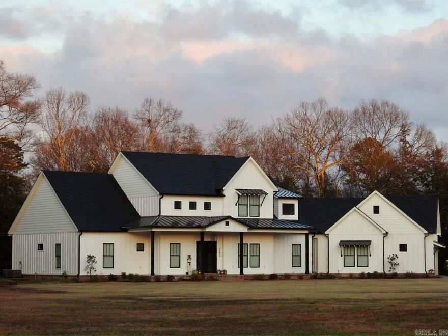 Spacious 4 bed, 3 1/2 bath home built by Drew Hester Construction. This home sits on 6.43 acres in East Conway-3miles from I-40 & Lewis Crossing shopping center. The home is located in the cul-de-sac of a 1 street neighborhood. In addition to its wonderful location, the home boasts a 30x40 shop with heated/cooled office, large L shape pool with sun deck built in 2021 and surrounded by a black iron fence. Within the home you will find an office with lots of organization, gun room with safe door, upstairs bonus room and 4th bedroom and bath, hidden pantry, large walk-in closet that connects to master suite, and an open floor plan that is great for family time and hosting.