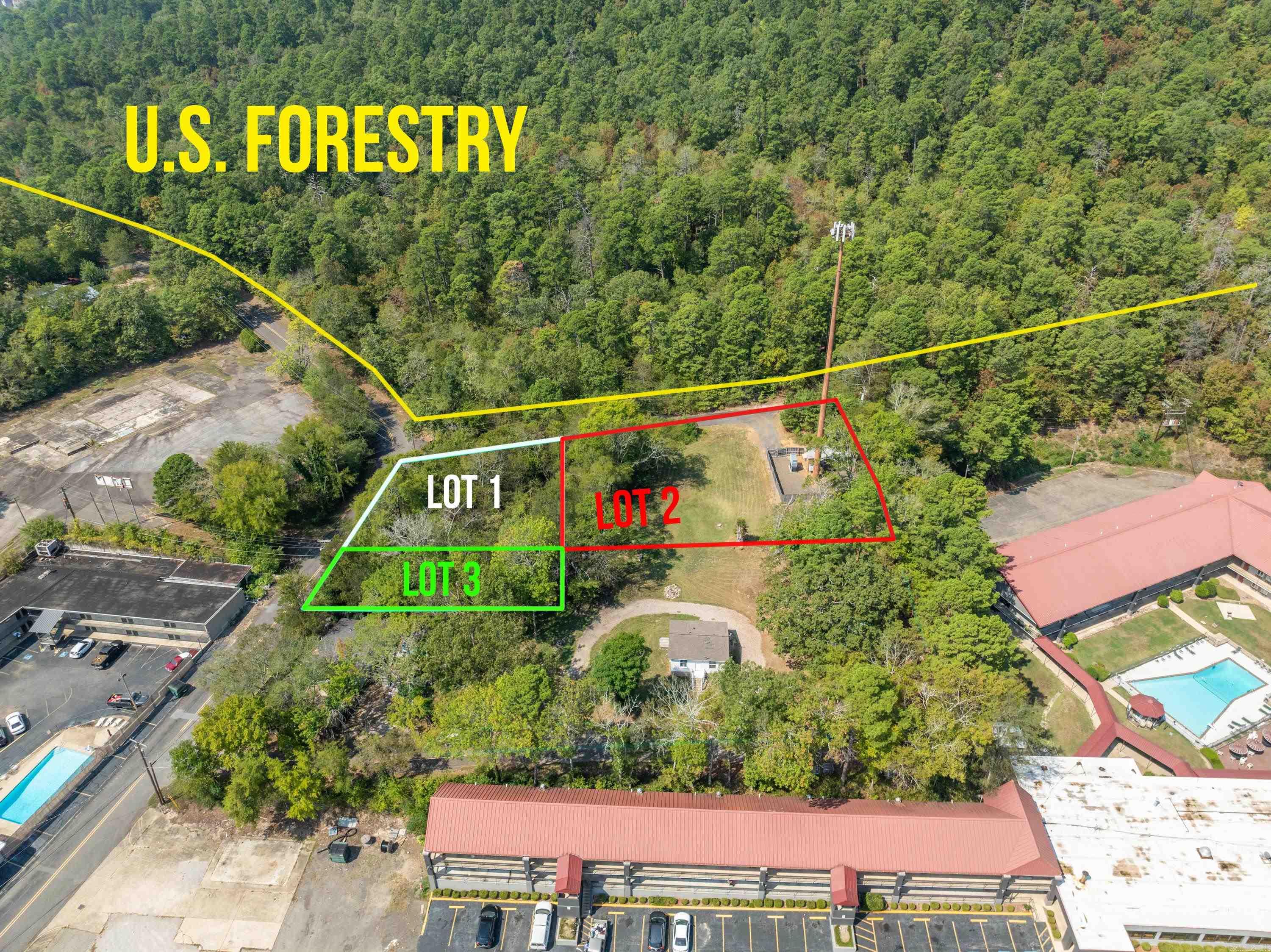 This amazing property is located directly across from USA forest land and offers a rare chance to own nearly an entire block. With C4 zoning, the possibilities are limitless! Could put in single family home or imagine the potential for a RV campground, with scenic hiking trails starting right at the front door, appealing to outdoor enthusiasts and nature lovers alike. Cell phone tower has a perpetual lease and is of no value unless they request to expand.