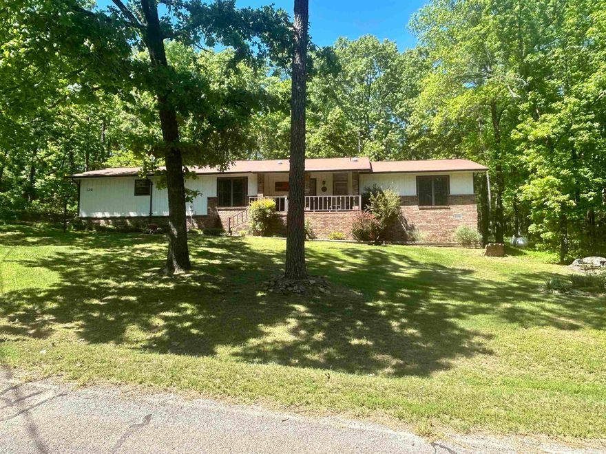 Welcome to this well maintained 3 Bd 2 Bath home in Fairfield Bay. This home offers comfort, charm, and a peaceful setting surrounded by great landscaping. The spacious living room is perfect for relaxing with a fire in the gas fireplace. The kitchen offers plenty of cabinet space and functionality. The primary bedroom has a private bath and generous closet space. Many small upgrades completed. Take advantage of all Fairfield Bay amenities including golf courses, pools, trails, marina access, and more. Perfect as a full-time residence, vacation home, or investment opportunity!