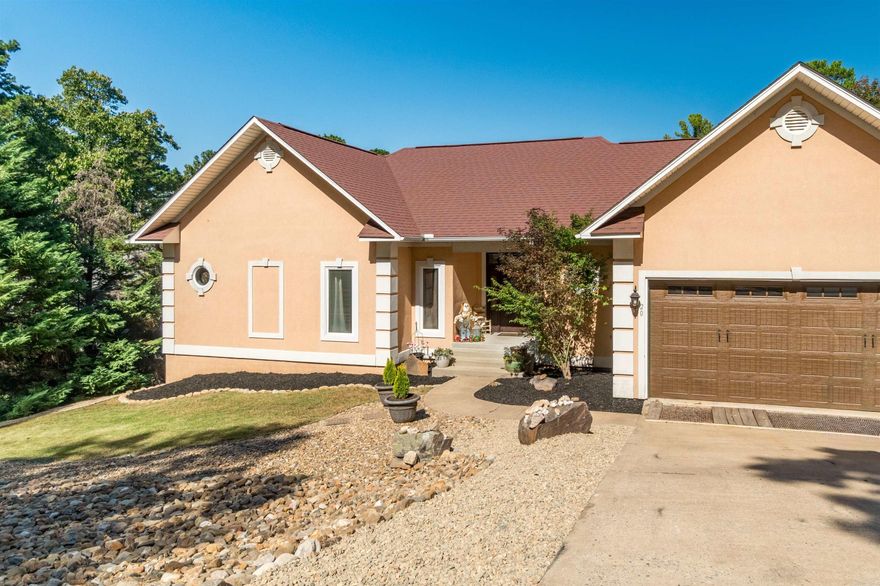 Spacious 4-bedroom, 3-bath home in Hot Springs Village featuring stunning mountain and vista views! This two-story residence offers 3,846 sq ft of thoughtfully remodeled living space, blending modern updates with timeless comfort. Highlights include an open-concept kitchen and dining area, den, office, game room, media room, and walk-in closets. Relax outdoors on the deck and patio, set on a peaceful 0.26-acre cul-de-sac lot. The property also includes a 2-car garage and access to all Village amenities—easy access to West gate shopping, golf, trails, lakes, pools, and more—making it ideal for everyday living or entertaining. The backyard is partially fenced. New front yard landscaping with rock boarders and fresh mulch just completed for care free yard work.  A must-see to truly to experience the serenity of this setting. Perfect as a family home or for retirees who love hosting guests! Come and see what Villagers Love about Hot Springs Village.