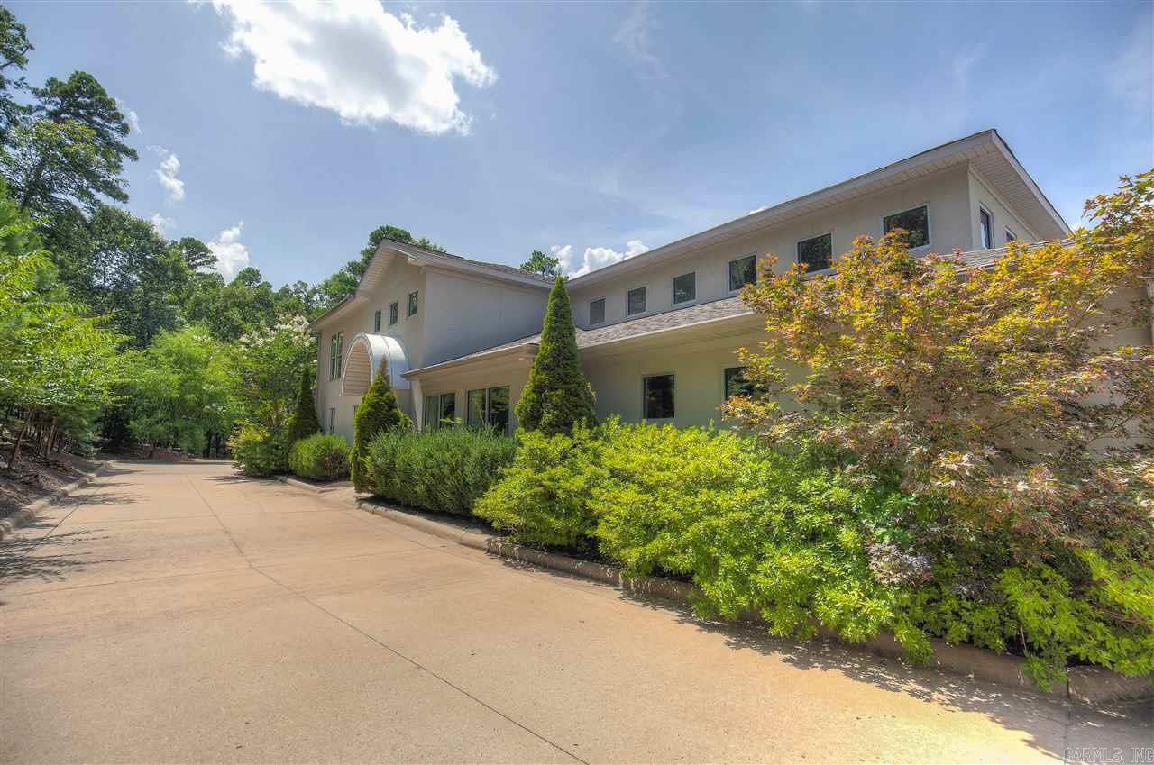 Featuring the height of design & sophistication, this stunning contemporary in a private gated neighborhood with spectacular views & includes an additional adjoining lot for added privacy. Sleek & stylish, it has the ultimate in luxury finishes & decor. A contemporary resort-like retreat encapsulating clean lines, white walls & huge windows which flood the open space w/light, inviting the scenic views in. With a light & airy elegance, meticulous attention to detail & superb amenities, it is truly sublime.