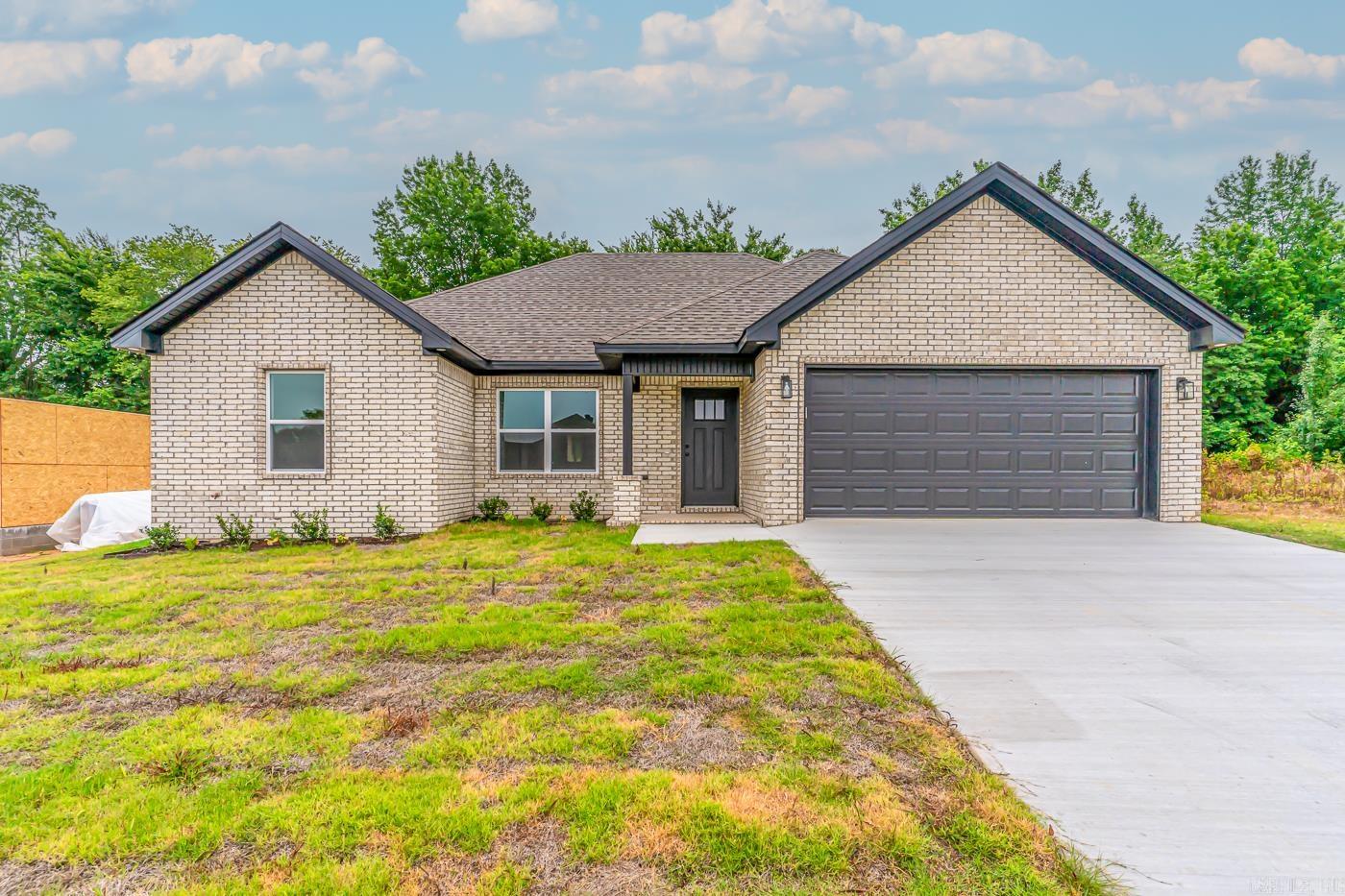 Back on Market New Construction due to NO FAULT of Seller! 501 Park in Bono, AR! This 3BR/2BA all Brick home is bursting at the seams with Style & Elegance! Enter the front door to an open concept masterpiece! You will feel right at home with the cozy fireplace (with different color settings for all occasions!) The impeccable kitchen is perfectly designed with white cabinets & black granite countertops with a slight hint of white designs. After a long hard day escape to the back covered porch to provide a hint of oasis. Master bath includes an absolutely gorgeous walk-in shower & double vanity separated by a cleverly designed vanity cabinet tower. Followed by a huge walk-in closet. Come & see this Beauty!