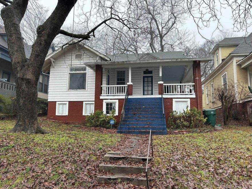 Historic Capitol View bungalow with a great view of the Capitol Building from the big, wrap around front porch;  Two bedrooms, a bath and a half, formal dining room, and two living areas; Refinished original hardwood flooring, 10 foot ceilings, original hardware, and large pocket and French doors; Spacious front and back yards and both covered and uncovered off street parking pads from the alley access;  House is being sold-as, no seller property disclosure available, and final sale will require probate court approval;  A copy of an inspection performed on 9/2/23 is available for review in the multiple listing service associated docs section;  This one is ready to move and priced to sell to any of you investors or someone wanting to love it to its potential luster.