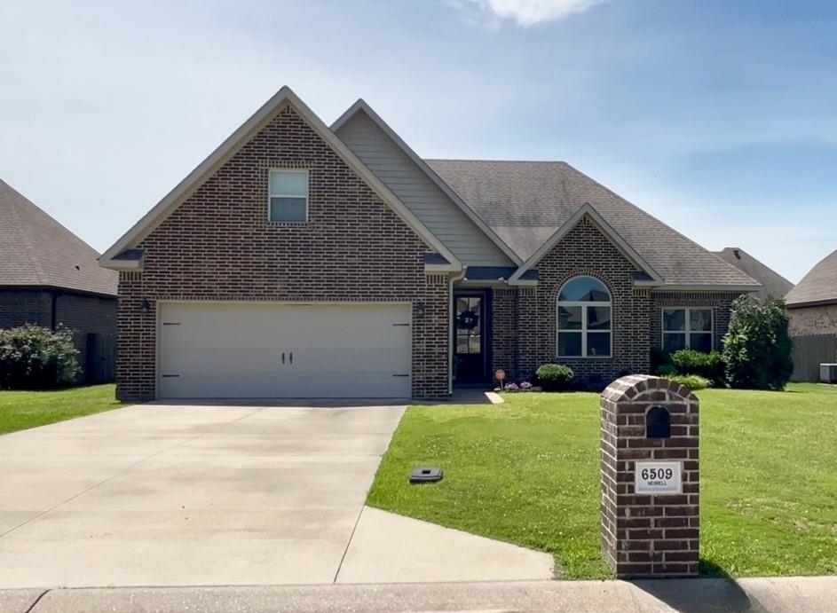 This all brick 4 Bedroom, 2 Bathroom home features 12ft ceilings, a beautiful kitchen/living room with large windows, which allows for plenty of natural light, an upstairs bonus room that could be used as an office or 5th bedroom, and has 2,423 SqFt with an open floor plan. The kitchen and bathrooms have granite countertops. The master bedroom has tray ceilings and the master bathroom features double sinks, soaker tub, and a custom tile shower. Additional features include crown molding, good sized closets throughout with wood shelving units, foam insulation, good sized fenced in backyard, and screened-in back porch. This is a must see property. Call to set a showing today!!