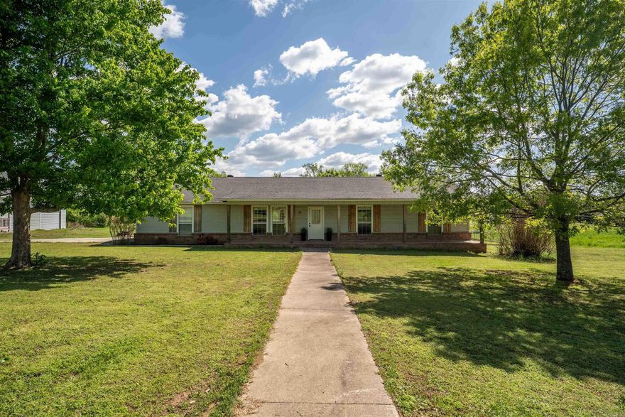 Spacious, Updated Home with Bonus ADU and Massive Garage Space! This move-in-ready home offers modern updates, a functional layout, and a full additional living space with its own kitchen and bath. Inside the main house, you'll find updated flooring, sleek light fixtures, crown molding, and a stylish kitchen with all appliances included. The bedrooms are oversized with large closets, and both bathrooms have been thoughtfully updated. The owner’s suite includes a walk-in closet and private ensuite bath. A large laundry room with a half bath adds convenience, and a bright office area makes the perfect work-from-home setup. The detached ADU features high ceilings, an updated kitchen, tiled walk-in shower, and plenty of storage—ideal for guests, extended family, or rental potential. Outside, enjoy two massive garages, including one with dual 12-foot bay doors—perfect for hobbies, storage, or a workshop. Plus, the roof was replaced in 2024! Official measurements are available