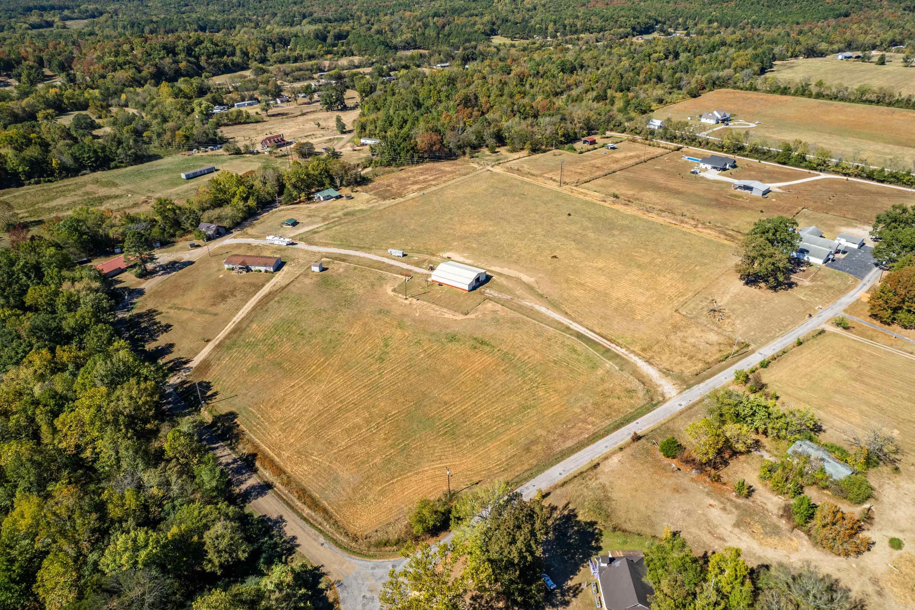 Dual-Home Oasis on 14 Acres ā Perfect for Horse Enthusiasts or Dream Builders! Discover the endless possibilities with this stunning 14-acre property, just 15 minutes from Hot Springs Village and 20 minutes from downtown Oaklawn Casino. Whether youāre a horse enthusiast seeking ample space or someone ready to create your own personal retreat, this expansive lot offers the perfect setting. This unique property features not just one, but two homes, providing flexibility for multi-generational living, rental income, or a guest retreat. The peaceful, sprawling land is ideal for equestrian pursuits, farming, or simply enjoying the natural beauty of the Arkansas countryside. With its unbeatable location close to top amenities yet nestled in the heart of Arkansas. Make this versatile property your own, whether it's for family living, investment, or your passion for horses and the outdoors. Donāt miss out on this one-of-a-kind chance to live the country life while staying close to everything Hot Springs has to offer!