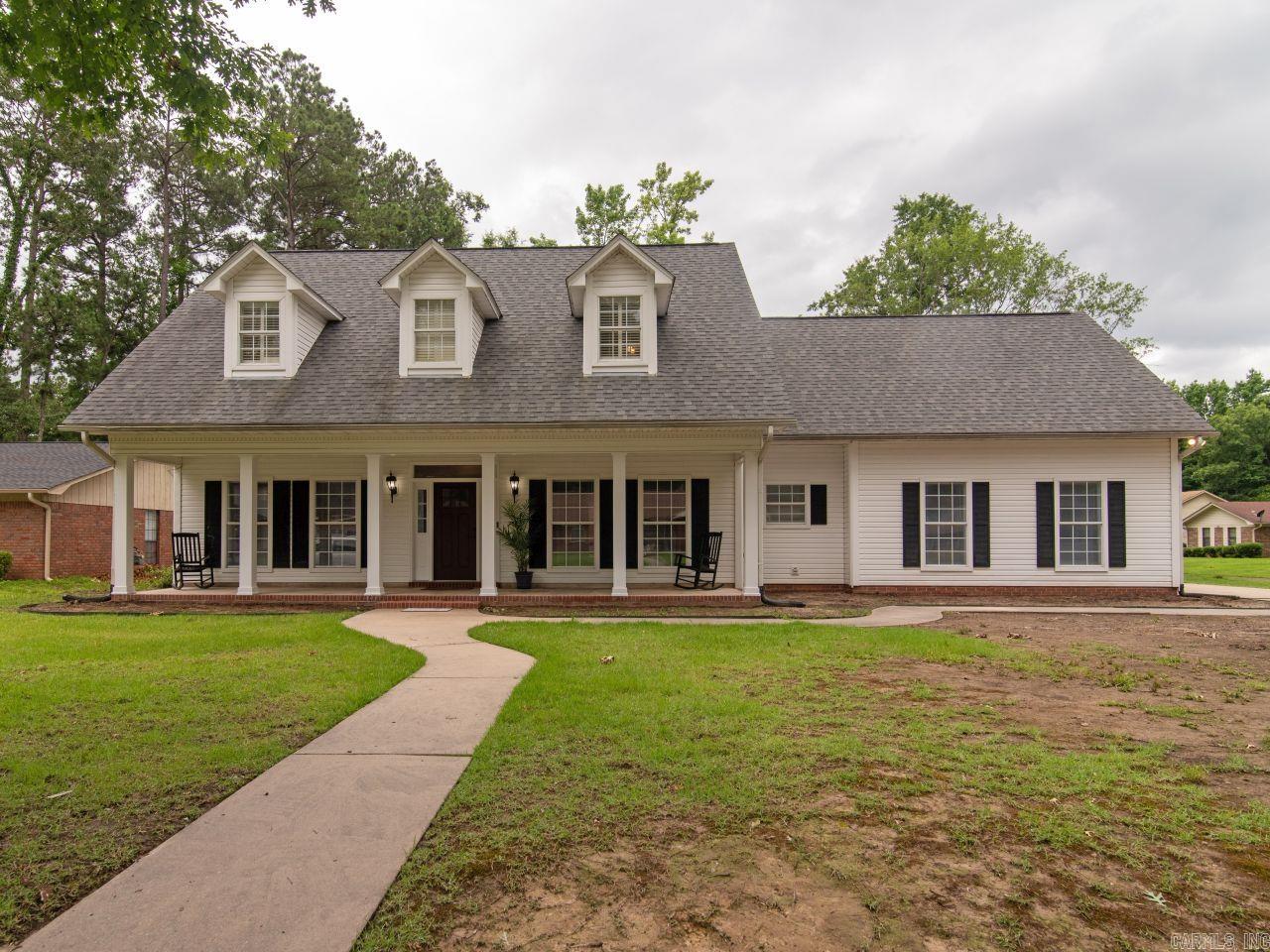 If you're looking for a spacious home with traditional and modern amenities, you've found the right one. This home boasts 2 living areas along with an office/playroom and a separate dining room. There are 3 bedrooms and 2 baths upstairs with the master bedroom on the main level. There are wood and terra cotta tiles throughout with no carpet. The kitchen is very spacious with beautiful natural light beaming throughout. The dining room is inviting with plenty of space for the family to gather for meals. Everyone can relax in the family room to catch a movie or just gather to talk about their day. This home is located in the Deerfield addition of South Pine Bluff. It is close to everything including shopping, schools, restaurants..etc. Come on out and take a look. You will want to stay! Call for your personal tour today! UPDATE!!! OVER 25K RECENTLY SPENT UPDATING THE PROPERTY!! Updates include but not limited to new shelving, new flooring in most areas, new interior paint to be completed June 2024, and $4,500 spent on cutting branches, trees, and updating the landscape.