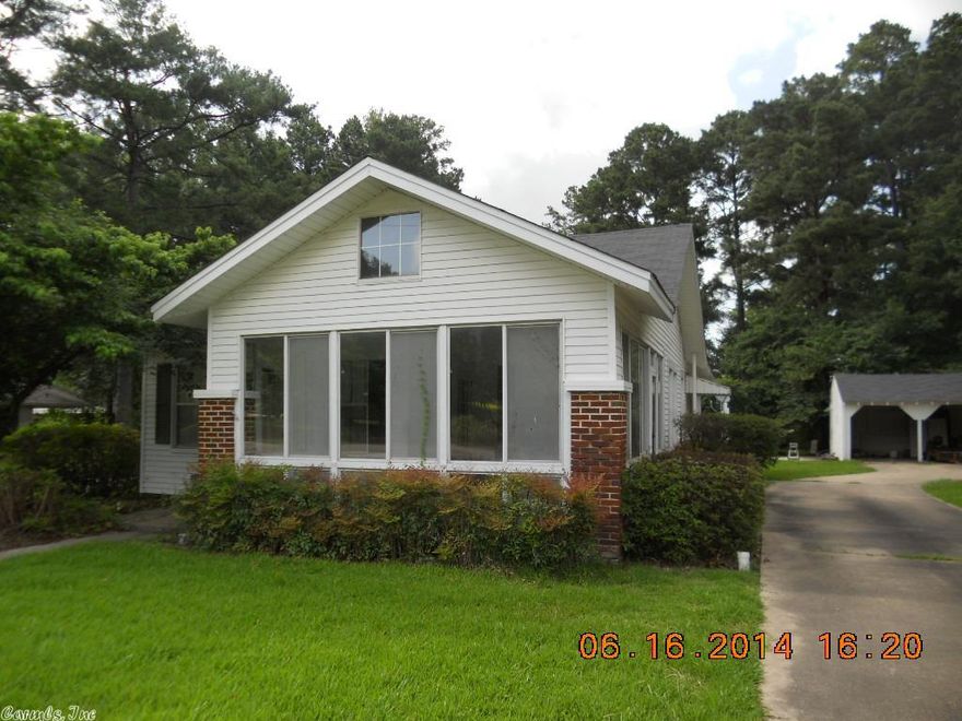 Very nice older home on large tree shaded lot. Vinyl siding. Heat, air, roof and plumbing repaced 5 years ago. Hardwood floors 9 foot ceilings, large laundry, great sunporch, 2 car detached carport with work room or storage. Deep lot. Great house with lots of character.