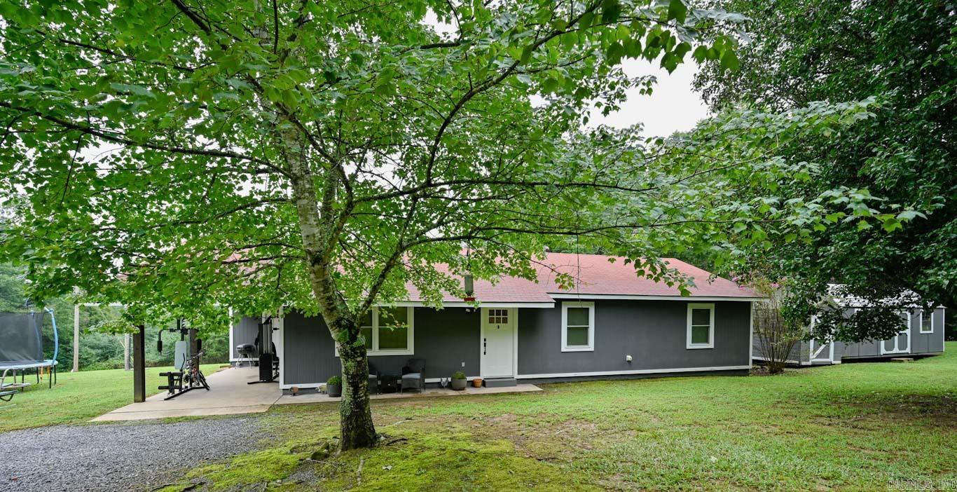 Welcome to your serene country retreat in the heart of the Shady Grove area of Polk County, Arkansas! This beautifully remodeled home offers the perfect blend of modern comfort and peaceful, rural living. Every inch of this property, inside and out, has been meticulously updated, including a stunning new kitchen and two completely renovated bathrooms. Step inside to a fresh, contemporary space designed for both relaxation and entertaining. The primary bedroom suite provides a private sanctuary, featuring an en-suite bathroom that has been stylishly appointed. Outside, you'll discover a tranquil setting where random wildlife, from deer to turkeys, frequently meanders through the yard, offering a true connection with nature. Enjoy the best of both worlds with this ideal locationājust a short 4.5-mile drive from the conveniences of Mena, Arkansas, yet far enough to feel a world away. This home is a rare gem, ready for you to move in and start enjoying the quiet, country lifestyle you've always dreamed of.